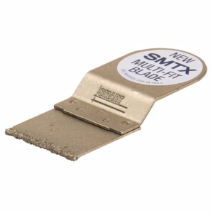 Gold-colored metal blade scraper tool with a flat beveled edge and a round label on the back reading 'NEW SMITX MULTI-HIT BLADE'