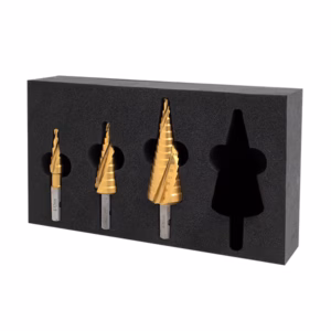 Set of four gold-coated drill bits in a black foam insert, arranged by size.