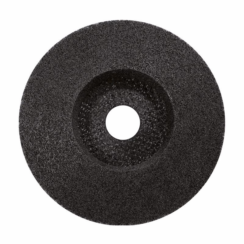 CGUFD125F_4 - Alpha Tools Dark abrasive grinding wheel with a central bore and rough outer surface (ring-shaped).