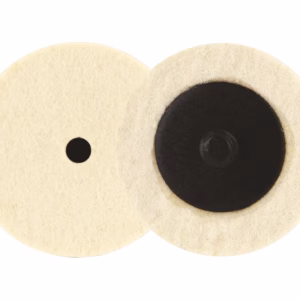 Two beige felt circles overlap in the center, with a small black dot on the left circle and a large black disc in the right circle.