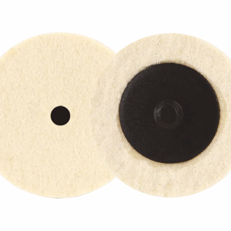 GFPD50 - Alpha Tools Two beige felt circles overlap in the center, with a small black dot on the left circle and a large black disc in the right circle.