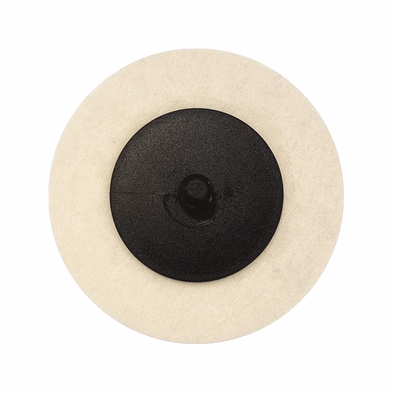 GFPD75_2 - Alpha Tools Close-up of a beige circular polishing wheel with a black center hub.