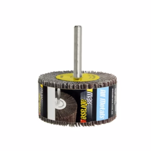 A round abrasive flap wheel mounted on a metal shank for grinding and finishing metal surfaces with stacked abrasive flaps