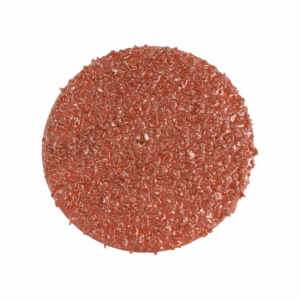 Round raw beef patty with a textured surface on a white background.