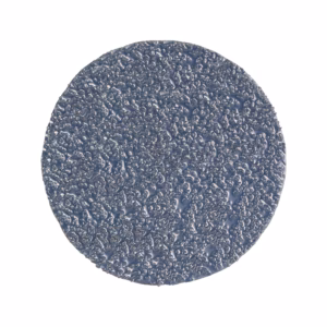 Close-up of a matte blue circular disk with a rough bubbled texture.