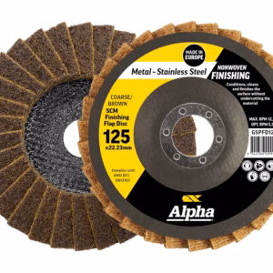Two metal finishing flap discs (125 grit) with Alpha brand label for stainless steel use, showing brown and gray abrasive surfaces beside a yellow/black label.