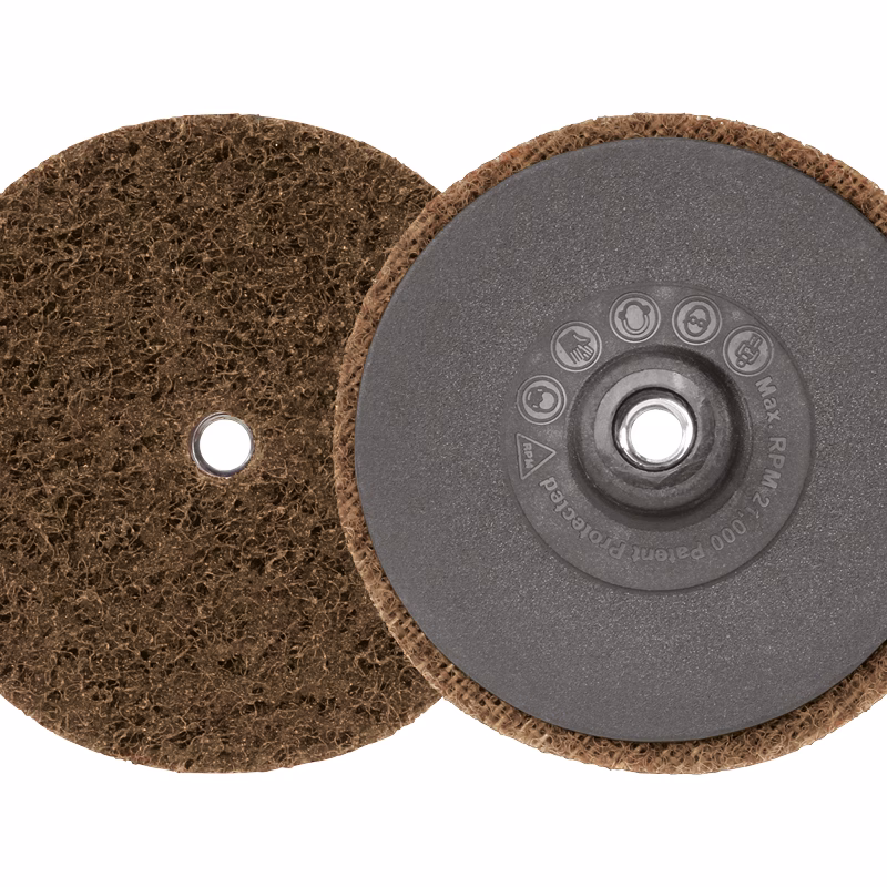 GTKSP75C - Alpha Tools Two round brown sanding discs, one with a rough abrasive surface and a central hole, mounted on a reusable backing pad.