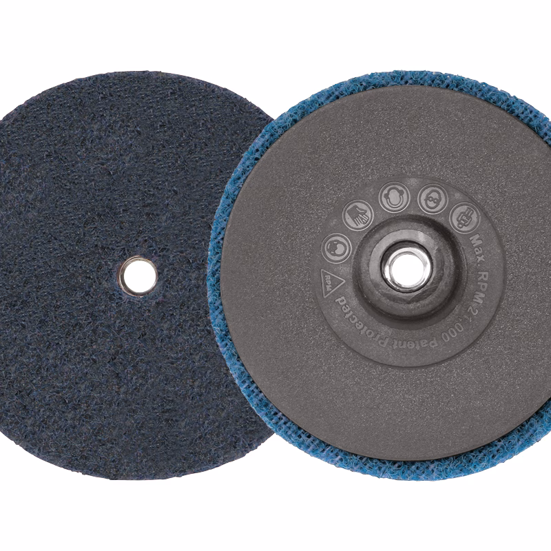 GTKSP75F - Alpha Tools Two circular abrasive polishing discs, one with a blue underside, laid side by side on a white background, for polishing surfaces.