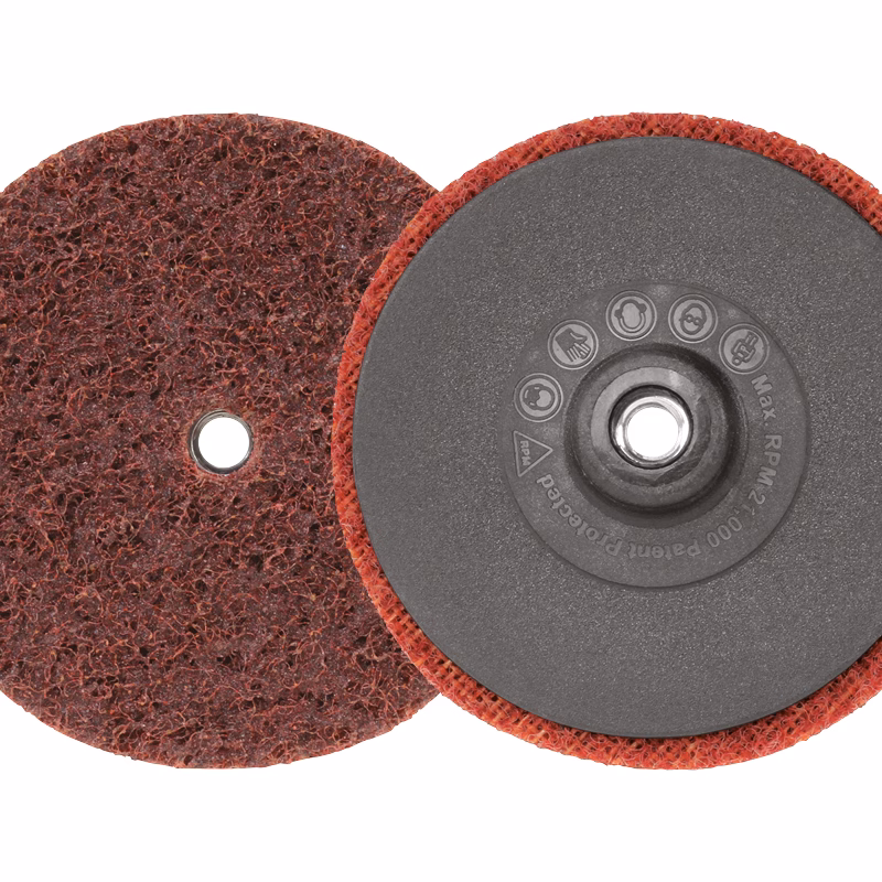 GTKSP75M - Alpha Tools Pair of red abrasive discs with central hubs, used for grinding or polishing surfaces on a rotary tool.