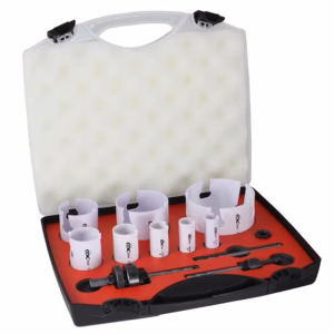 Open black case with red foam insert containing multiple white plastic drill guides and small metal tools