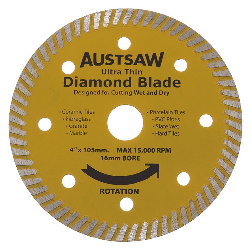 Yellow 4-inch diamond cutting blade with center bore and multiple vent holes; reads 'AUSTSAW Ultra Thin Diamond Blade' for wet/dry cutting.